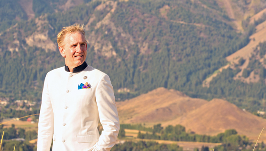 Sun Valley Summer Symphony celebrates its 35th season and Music Director Alasdair Neale outside in front of mountain