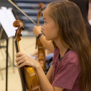 girl holding violin